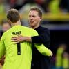 Bundestrainer Julian Nagelsmann (r) umarmt nach dem Sieg Deutschlands Torhüter Manuel Neuer.
