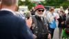 Motorradfahrer und Menschen mit Behinderung bereiten sich am Freitag (05.07.24) vor den Mainfränkischen Werkstätten in Würzburg auf ihre gemeinsame Tour vor. Seit 1989 treffen sich auf Initiative von Peter Schädel Biker und Menschen mit Handicap einmal im Jahr zu einer Motorradtour.