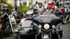 Motorradfahrer und Menschen mit Behinderung bereiten sich am Freitag (05.07.24) vor den Mainfränkischen Werkstätten in Würzburg auf ihre gemeinsame Tour vor. Seit 1989 treffen sich auf Initiative von Peter Schädel Biker und Menschen mit Handicap einmal im Jahr zu einer Motorradtour.