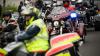 Motorradfahrer und Menschen mit Behinderung bereiten sich am Freitag (05.07.24) vor den Mainfränkischen Werkstätten in Würzburg auf ihre gemeinsame Tour vor. Seit 1989 treffen sich auf Initiative von Peter Schädel Biker und Menschen mit Handicap einmal im Jahr zu einer Motorradtour.