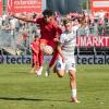 Theo Harz (23) von den Würzburger Kickers im Zweikampf mit Adam Aznou Ben Cheikh (2) vom FC Bayern München II. Die Würzburger Kickers verlieren am Samstag 24.08.24 das Heimspiel gegen Bayern München II mit 1:4 in der AKON Arena in Würzburg.