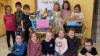 Die Vorschulkinder vom "Sonnenland" mit den gesammelten Spenden.