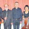 Sie spielen im Festsaal: Manfred Wengoborski (Geige), Otto Winter (Oboe), Georg Schäffner (Piano/Cembalo) und Keiko von Stackelberg (Cello) sind die Bamberger Bachsolisten.