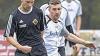 Keine Chance: Meist das Nachsehen hatten die Schneyer Spieler, wie hier Philipp Kober (re) gegen DJK-Akteur Fabian Grübert.