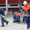 Die Jugendfeuerwehrleute beim Aufbau eines Löschangriffs. Die Jugendfeuerwehrleute beim Aufbau eines Löschangriffs.
