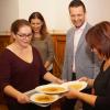 Bürgermeister Andreas Hügerich freut sich im Beiisein von Vertretern des Thüringisch-Fränkischen Reisebüros (im Bild Carina Schütz) über die Vorspeise, die gleich an die Besucher der Tafel und des HPZ verteilt wurde. Bürgermeister Andreas Hügerich freut sich im Beiisein von Vertretern des Thüringisch-Fränkischen Reisebüros (im Bild Carina Schütz) über die Vorspeise, die gleich an die Besucher der Tafel und des HPZ verteilt wurde.
