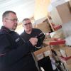 Malteser-Ortbeauftrager Georg Vonbrunn (li.) ist stolz auf das ehrenamtliche Engagement von Willi Fruck, dem Leiter des Malteser-Shops. Gemeinsam begutachten sie einen Schuh. Malteser-Ortbeauftrager Georg Vonbrunn (li.) ist stolz auf das ehrenamtliche Engagement von Willi Fruck, dem Leiter des Malteser-Shops. Gemeinsam begutachten sie einen Schuh.