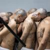 Insassen, die von den Behörden als Bandenmitglieder identifiziert wurden, werden in Tecoluca in das Gefängnis für Terrorismus gebracht. Das Foto wurde von der Pressestelle des Präsidenten von El Salvador zur Verfügung gestellt.