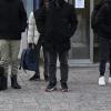 Migranten kommen nach ihrer Ausreise aus Russland an der Nuijamaa-Grenzstation zwischen Russland und Finnland an.