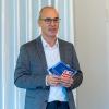 Hans Ulrich Gruber, Vorstandsmitglied des IT Clusters Oberfranken, begrüßte die zahlreich erschienen Gäste der Kooperationsveranstaltung.
