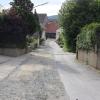 Der Ältestenrat kritisiert, dass die Giechkröttendorfer Straße im Bereich der Arzt- und Therapiepraxen noch immer keine geschlossene Decke erhalten hat.