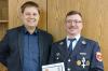 Bürgermeister Georg Neubauer überreichte Michael Ziegler die Ernennungsurkunde zum  Kommandanten der Feuerwehr Erlenbach für weitere sechs Jahre.
