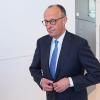 Der designierte Bundeskanzler Friedrich Merz (CDU) verlässt im Bundestag bei der Kanzlerwahl das Unions-Fraktionsbüro. Merz ist bei der Kanzlerwahl im Bundestag im ersten Wahlgang durchgefallen.