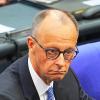 Der designierte Bundeskanzler Friedrich Merz (CDU) reagiert im Bundestag bei der Kanzlerwahl. Im Bundestag findet die Wahl und Vereidigung des Bundeskanzlers und der neuen Bundesregierung statt.