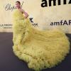Skye Hankey posiert für Fotografen bei ihrer Ankunft auf der amfAR-Benefizveranstaltung in Cannes.