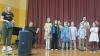 Große Erwartungen: Katharina Flierl mit dem Kinderchor der evangelischen Kirchengemeinde beim Kick-Off für das geplante Musikhaus.