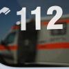 Ein Rettungswagen spiegelt die Aufschrift "112".