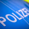 Der Schriftzug «Polizei» steht auf einem Streifenwagen.