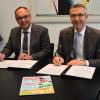 Das Bild zeigt Bürgermeister Martin Lenz (r.) aus Karlsruhe und Bürgermeister Bernd Stober aus Eggenstein-Leopoldshafen.