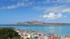 Badegäste am Strand auf der Mittelmeerinsel Sardinien (Archiv). Badegäste am Strand auf der Mittelmeerinsel Sardinien (Archiv).