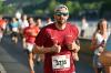 Zahlreiche Laeuferinnen und Laeufer nehmen am Donnerstag, 26. Juni 2025, am 2. WVV Energie Firmenlauf in Wuerzburg teil. 