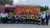 Erfolgreiche Leistungsprüfung: Die Aktiven der Feuerwehr Helmstadt mit Schiedsrichtern und Bürgermeister Tobias Klembt.