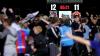 Die Fans von Grimsby Town feiern ihren Sieg im Elfmeterschießen gegen Manchester United.