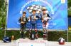 Elias Caydas (Mitte) gewann in Templin das zweite Rennen beim ADAC-Mini-Bike-Cup.
