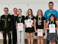 Topplatzierungen bei der Oberbayrischen Meisterschaft 2026 Disziplin Lichtgewehr:  1. Gauschützenmeister Markus Mayr, Jugendleiterin Magdalena Fürhofer, Isabel Müller, Hannah Ächter, Elena Fürhofer, Romy Ächter. 1. Schützenmeister Tobias Ächter (von links).