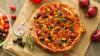 Auf der Laugen-Pizza sind die Deutschland-Farben durcheinandergewürfelt.