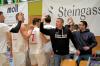 Auch wenn es eine Saison mit Höhen und Tiefen war, kann Cheftrainer Ajtony Imreh (in Schwarz) der Spielzeit 2025/2026 viel Positives abgewinnen.