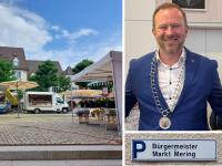 Die Bürgermeisterwahl in Mering muss wohl wiederholt werden. Das ist Gesprächsthema in Mering, auch auf dem Wochenmarkt in der Ortsmitte. Bürgermeister Florian Mayer (rechts) soll im Wahlkampf gegen das Neutralitätsgebot verstoßen haben.